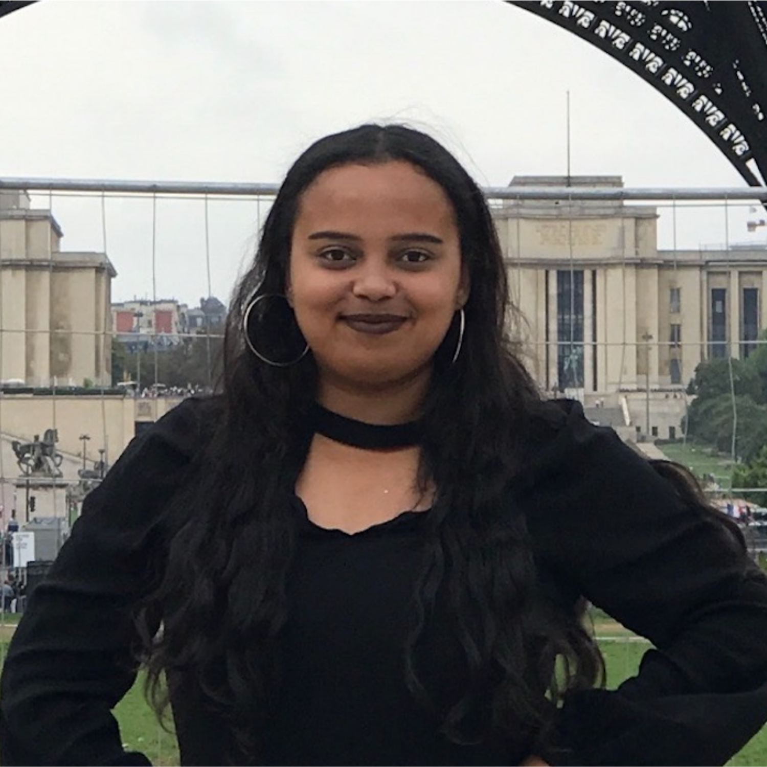 woman smiling wearing black