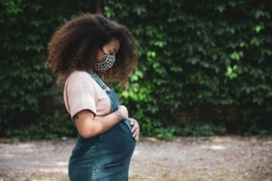 pregnant woman wearing face mask